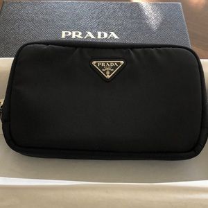 PRADA
Zipped Nylon Wallet In Black